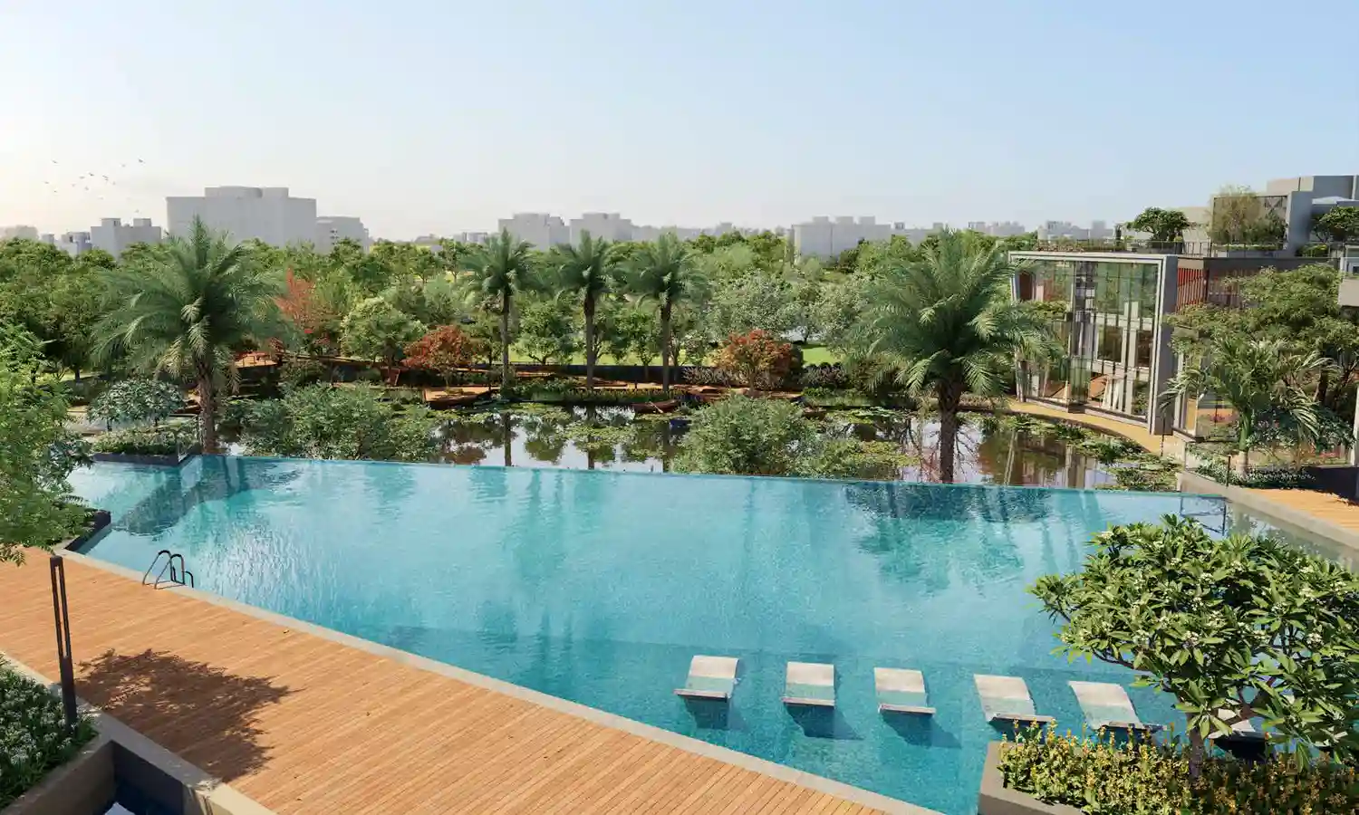 Infinity pool and landscaped water garden at Godrej Blue